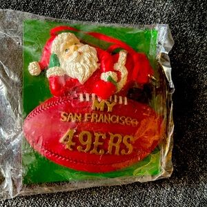 Team NFL 49ers Santa Claus tree ornament.